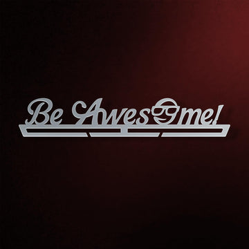 Be Awesome Medal Hanger V2 in laser-cut steel on a dark background
