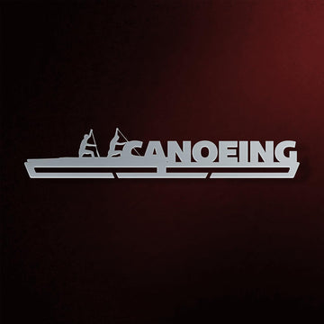 Canoeing Medal Hanger in laser-cut steel on a dark background