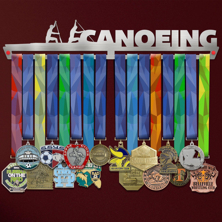 Canoeing Medal Hanger holding a full row of medals on a wall