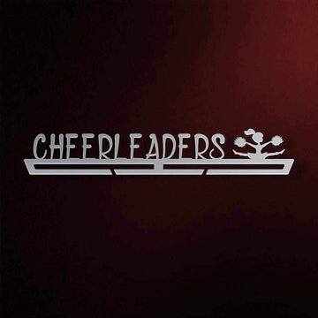 Cheerleading Medal Hanger in laser-cut steel on a dark background