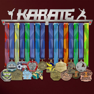 Karate Medal Hanger holding a full row of medals on a wall