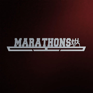 Marathon Medal Hanger in laser-cut steel on a dark background