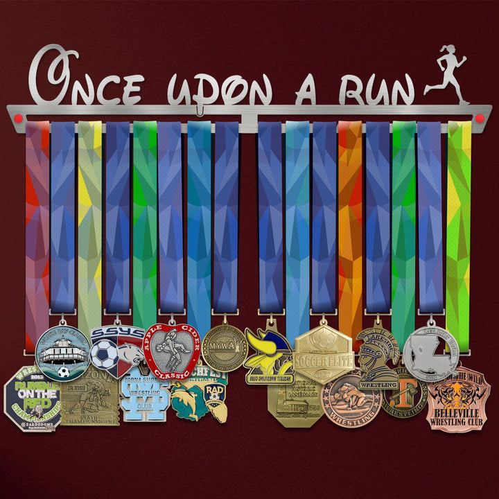 Women's Once Upon A Run Medal Hanger holding a full row of medals on a wall