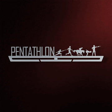 Pentathlon Medal Hanger in laser-cut steel on a dark background
