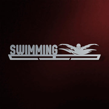 Swimming Medal Display in laser-cut steel on a dark background