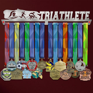 Triathlon Medal Hanger holding a full row of medals on a wall