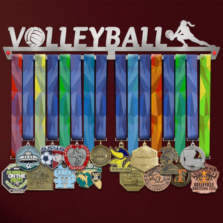 Women's Volleyball Medal Hanger holding a full row of medals on a wall