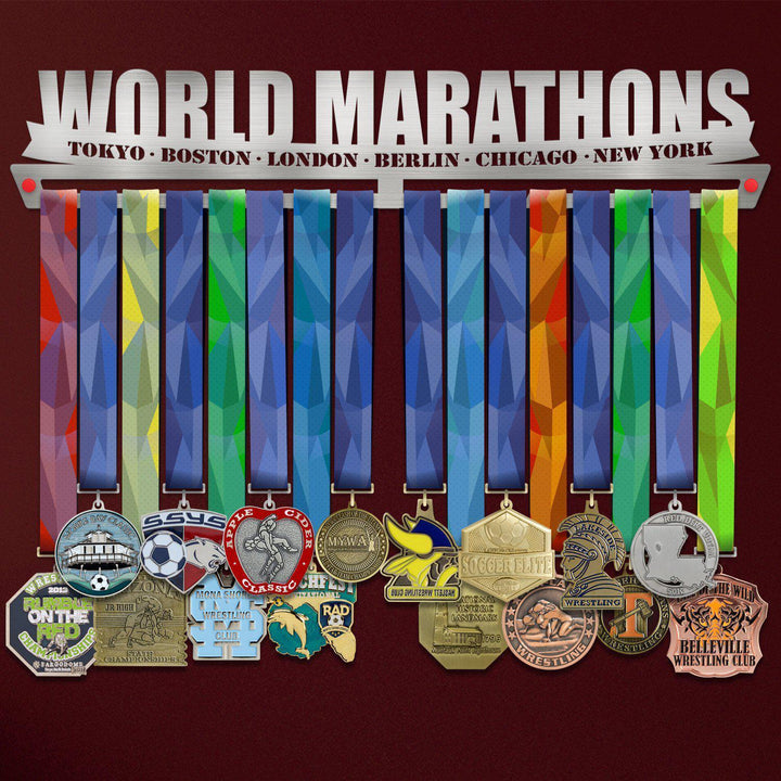 World Marathon Majors Medal Hanger V2 holding a full row of medals on a wall